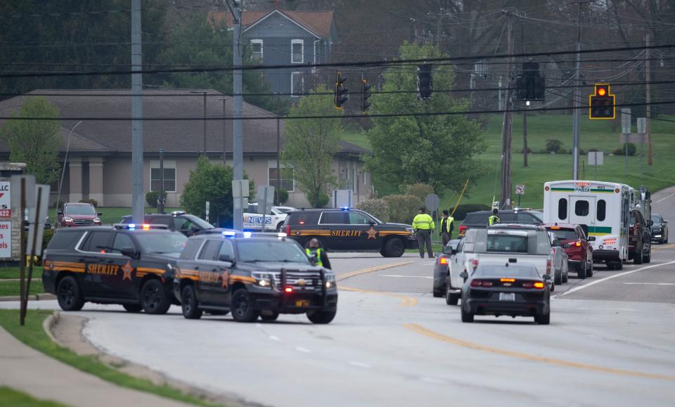 Police close Chestnut street at S.R.14 as the standoff continues.