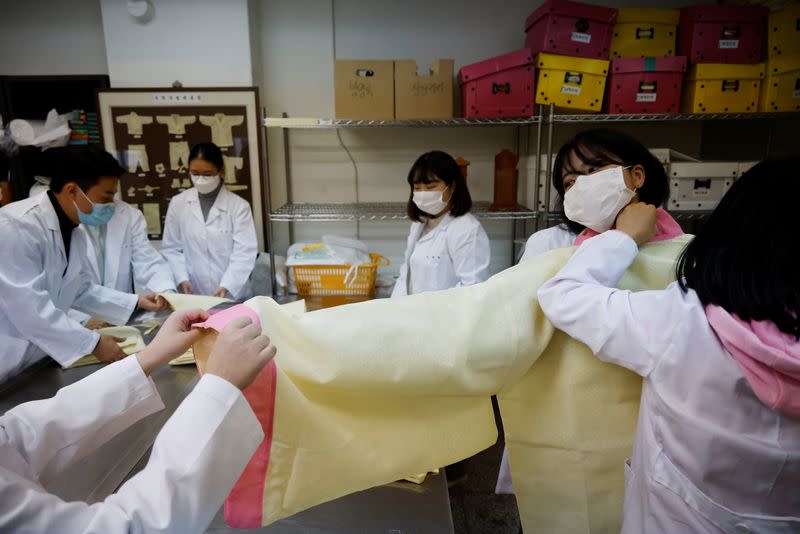 Park Se-jung who majors the funeral directing at Eulji University, prepares for a class on how to shroud the deceased practice, in Seongnam