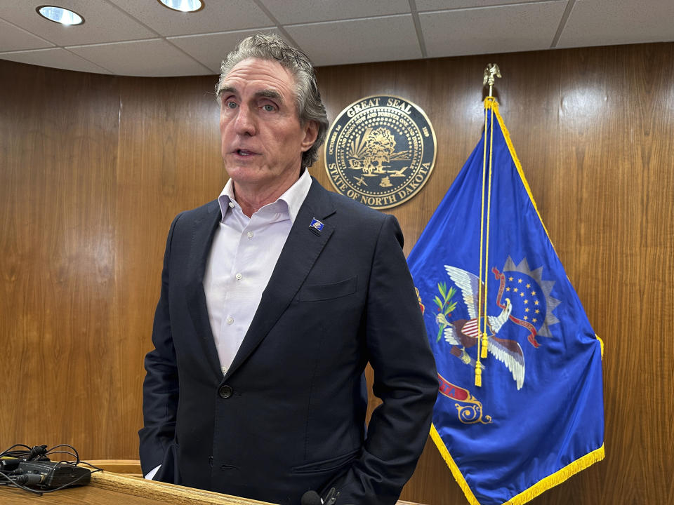 North Dakota Republican Gov. Doug Burgum talks to reporters after the Legislature ended its three-day special session on Wednesday, Oct. 25, 2023, at the state Capitol in Bismarck, N.D. Burgum expressed disappointment with the Senate rejecting a bill to expand a previous income tax cut, legislation he urged lawmakers to pass. The special session was primarily for resurrecting provisions of a major budget bill the state Supreme Court struck down last month. (AP Photo/Jack Dura)