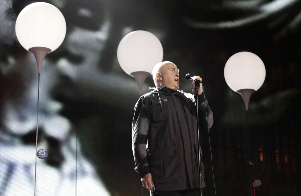FILE - British singer Peter Gabriel performs the song "heroes" during the central event to commemorate the Fall of the Wall at the Brandenburg Gate in Berlin, Germany on Nov. 9, 2014. Gabriel turns 71 on Feb. 13. (AP Photo/Markus Schreiber, File)