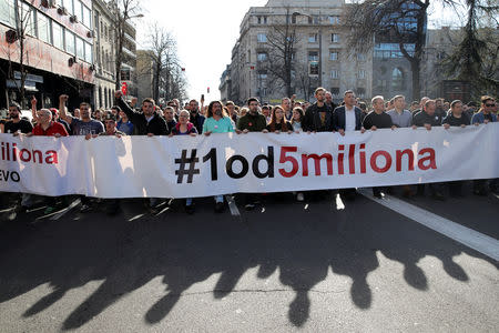 People march during a protest against Serbian President Aleksandar Vucic and his government, in Belgrade, Serbia, March 17, 2019. REUTERS/Marko Djurica