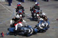 <p>Two police motorcycles crash during a demonstration as part of the Bastille Day parade on the Champs-Élysées in Paris, France, Saturday, July 14, 2018. (Photo: Francois Mori/AP) </p>