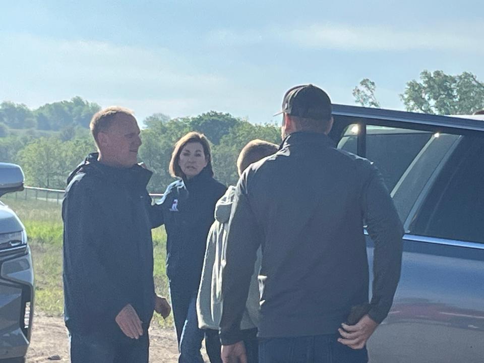 Gov. Kim Reynolds and her staff arrive in Greenfield on Wednesday, May, 22, 2024, to assess damage from a powerful tornado there.