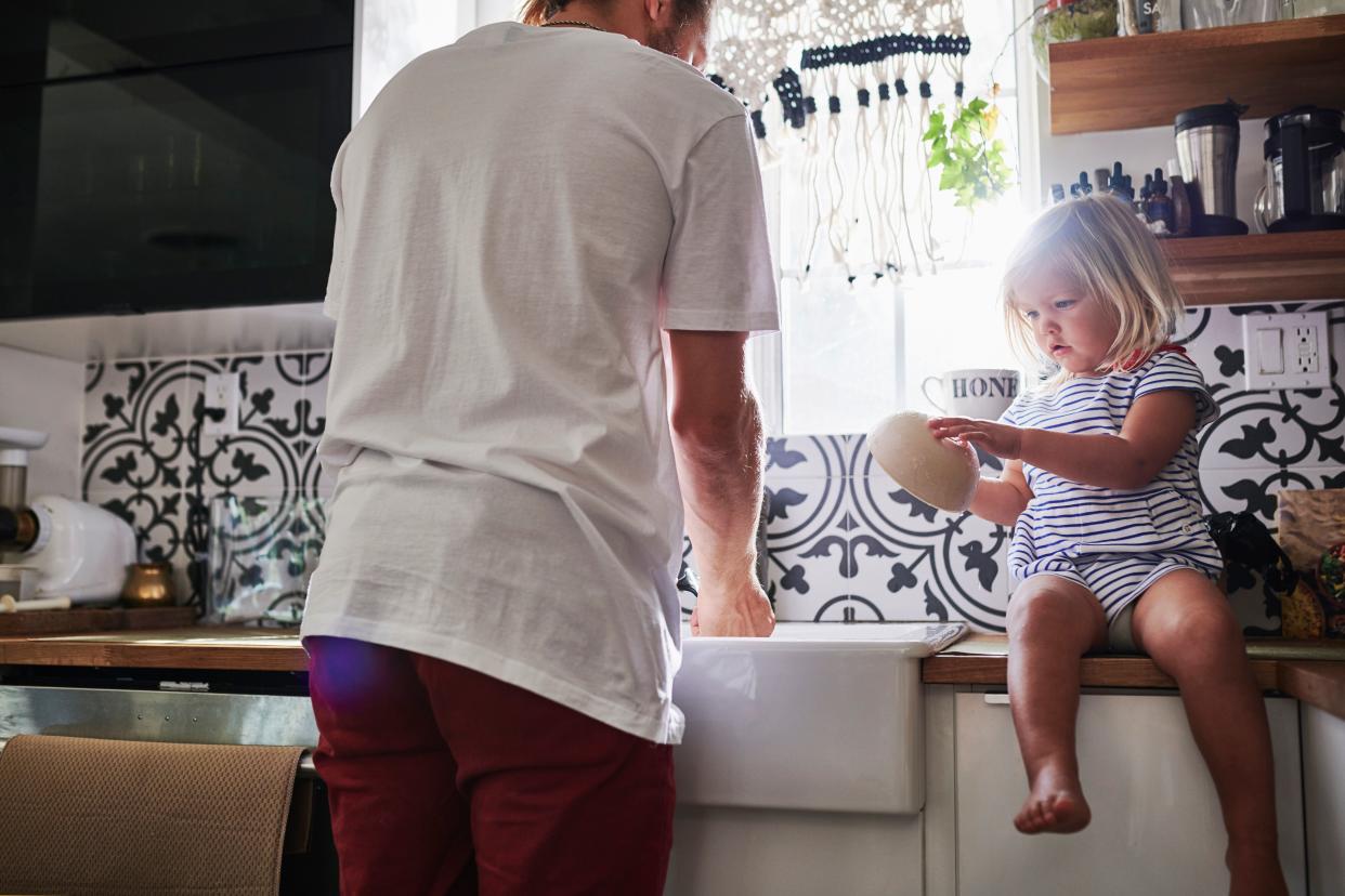 Make an effort to notice how even some of the most mundane activities you do every day are connected to your core values. For example, doing the dishes might be an act of generosity toward those you love. (Photo: The Good Brigade via Getty Images)
