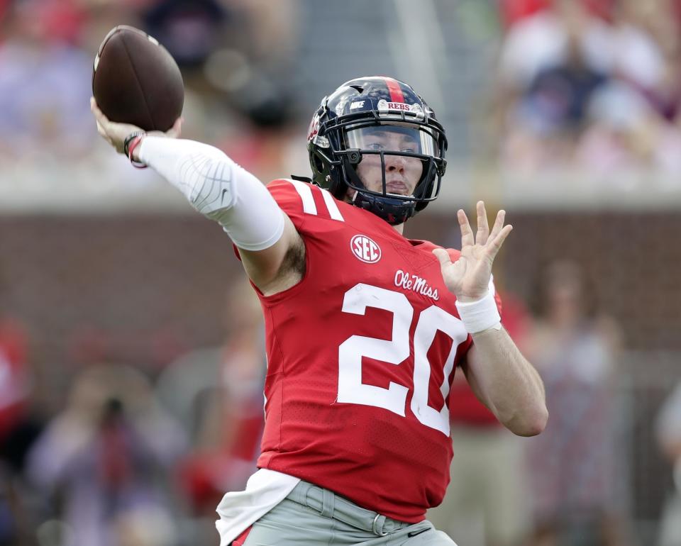 Shea Patterson threw for 3,139 yards and 23 touchdowns in 10 starts at Ole Miss. He transferred to Michigan in December. (AP Photo/Rogelio V. Solis, File)
