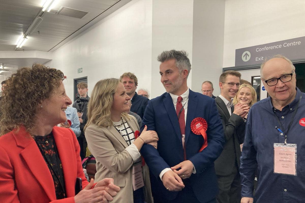 York and North Yorkshire's new Metro Mayor David Skaith, in the blue jacket, being congratulated by Labour supporters - including York council leader Claire Douglas , left - at the Harrogate Convention Centre after his victory on Friday <i>(Image: Alice Kavanagh)</i>