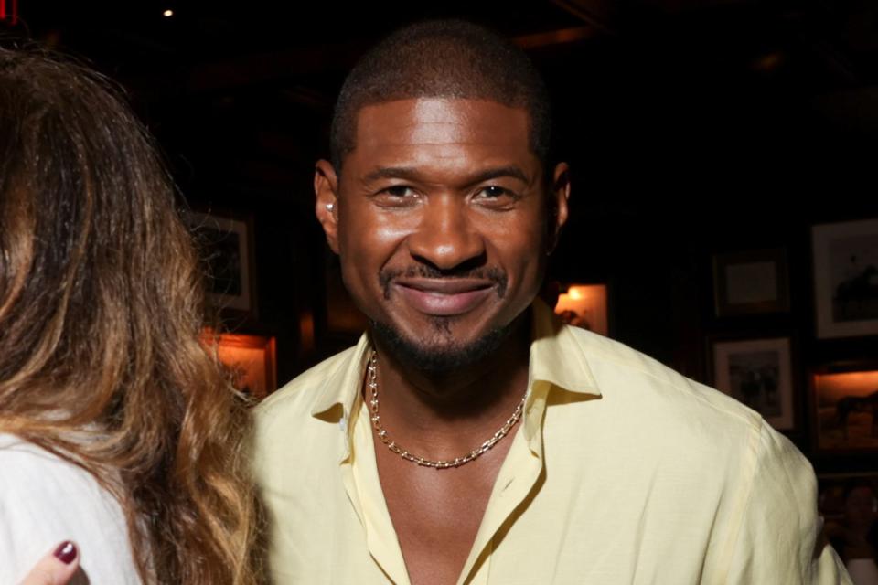 <p>Lexie Moreland/WWD via Getty</p> Usher at Ralph Lauren RTW Spring 2025 show on Sept. 5, 2024