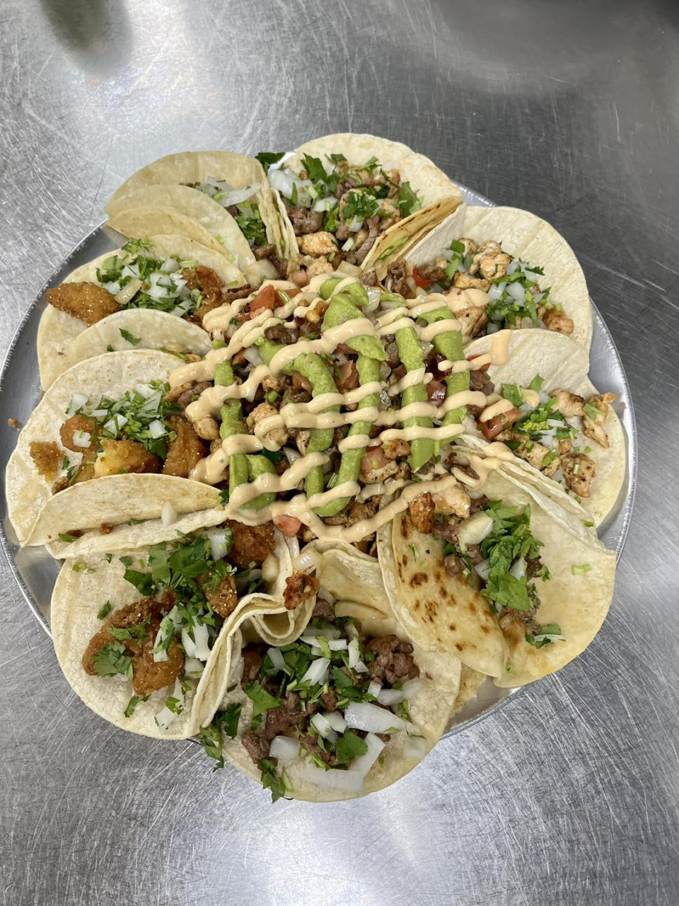 Dig into the taco platter at Top Shelf Bar & Grill