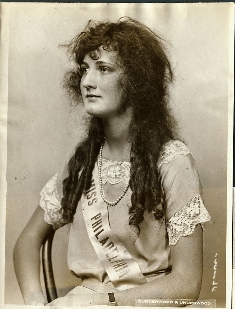 black and white photo of Malcolmson sitting