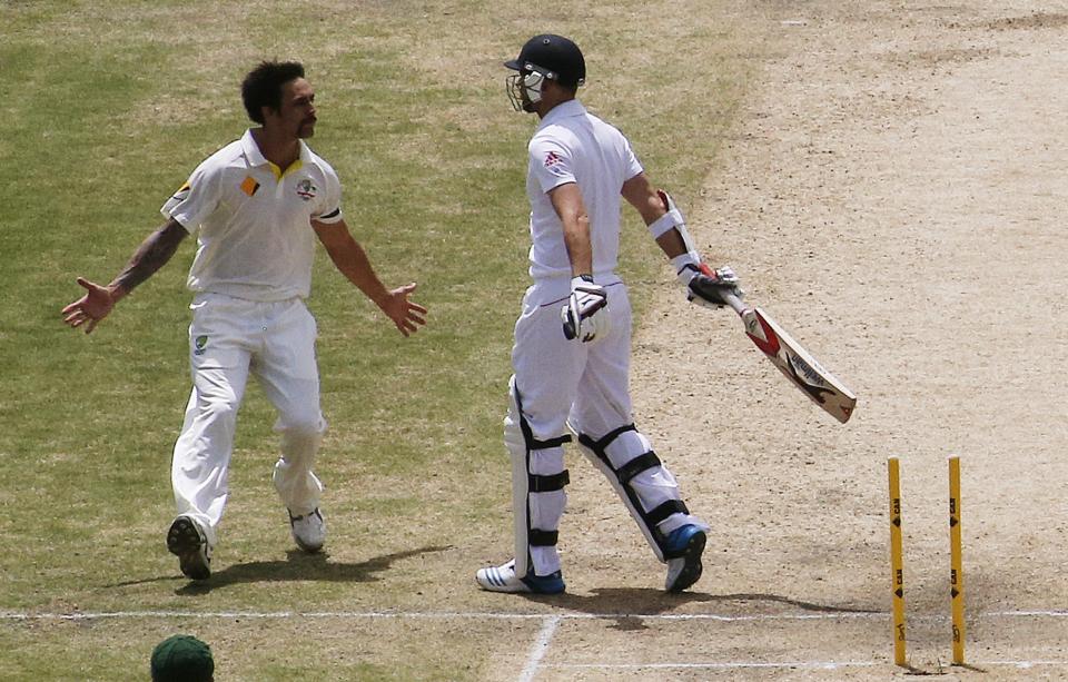 Australia's Mitchell Johnson (L) reacts to England's James Anderson after taking Anderson's wicket during the third day's play in the second Ashes cricket test at the Adelaide Oval December 7, 2013.