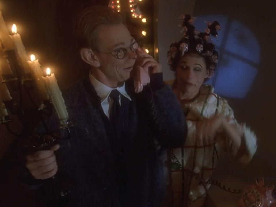 the lou whos using a candelabra in how the grinch stole christmas