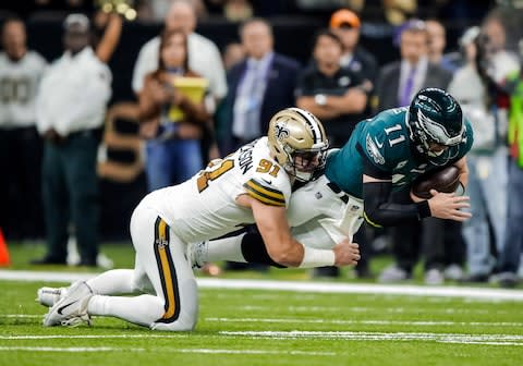 New Orleans Saints defensive end Trey Hendrickson (91) tackles Philadelphia Eagles quarterback Carson Wentz (11) during the first quarter at the Mercedes-Benz Superdome - Credit: Derick E. Hingle/USA TODAY