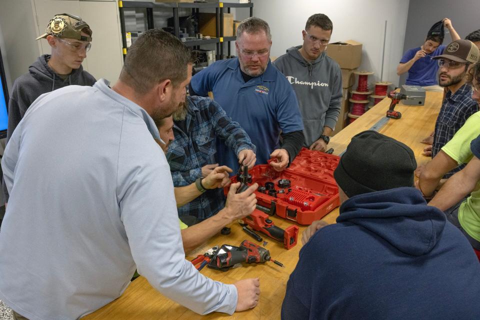 Program Director Todd Larsen and Rob Baumgartner, First year apprentice instructor go over the various tools that are used in electrical work. Asbury Park High School is looking into implementing a trade curriculum and programs like IBEW’s is what they would graduate to after the high school program.