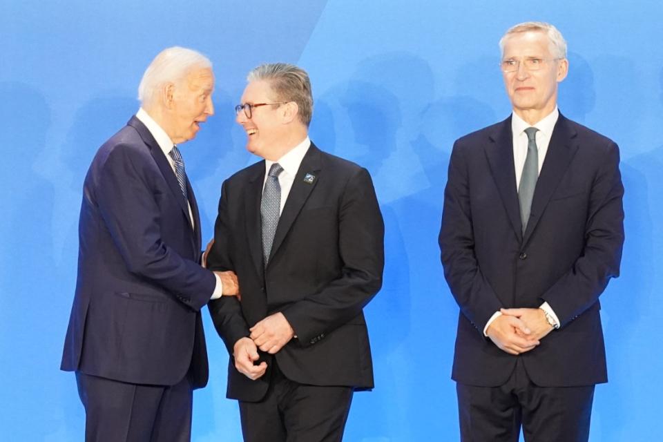 Keir Starmer is greeted by Joe Biden and Nato Secretary General Jens Stoltenberg as he arrives at the Nato 75th anniversary summit. (Stefan Rousseau/PA Wire)