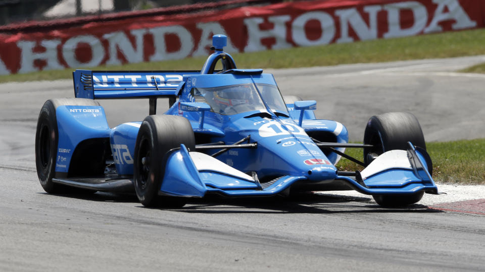 FILE - Alex Palou competes during an IndyCar race at Mid-Ohio Sports Car Course in Lexington, Ohio, in this Sunday, July 4, 2021, file photo. Only 62 points separate Palou and four other drivers with four races remaining and Palou was dealt his third pre-race penalty before he even arrived at Gateway. Honda has pulled the engine from Palou's car for a third time this season — twice this month — before a change was permitted under IndyCar rules. (AP Photo/Tom E. Puskar, File)