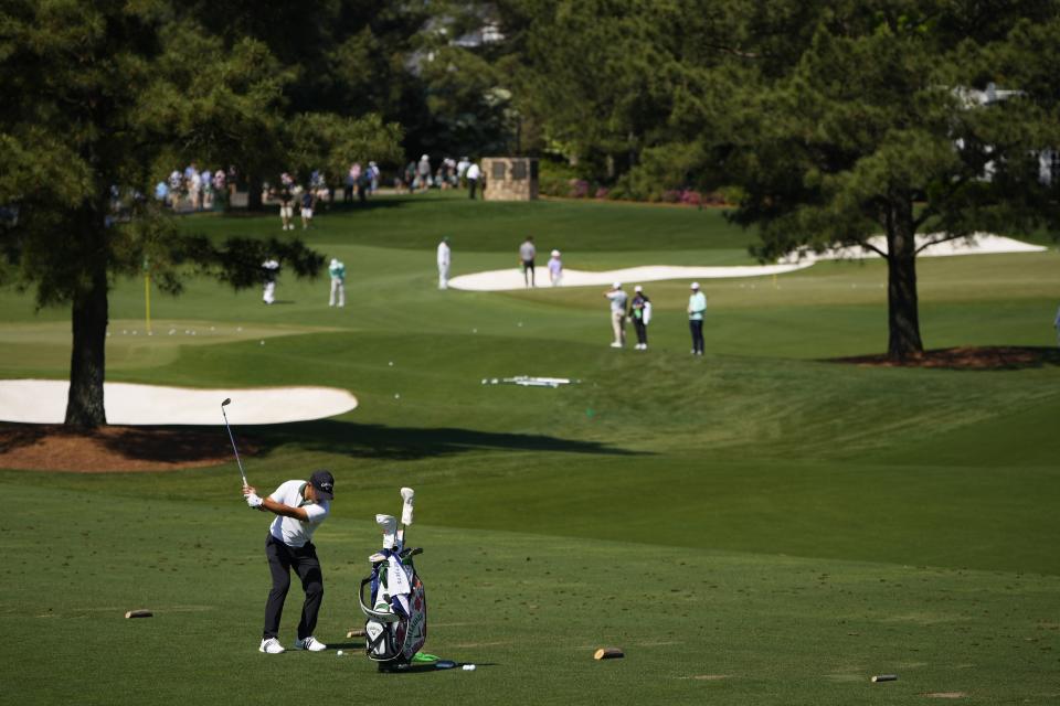 Xander Schauffele hits on the practice range during a practice round in preparation for the Masters golf tournament at Augusta National Golf Club Monday, April 8, 2024, in Augusta, Ga. (AP Photo/Matt Slocum)