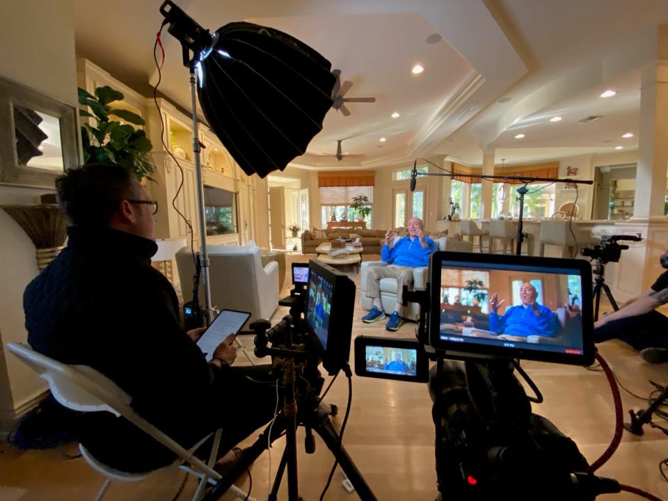 Nick Nanton, director of the documentary "Dickie V," watches Dick Vitale during filming at Vitale's Lakewood Ranch home. Photo courtesy DNA Films.