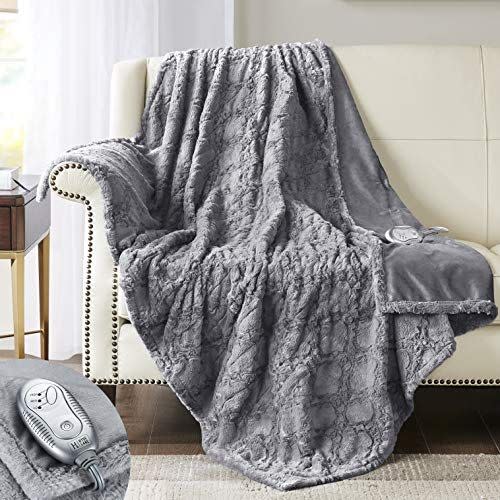 <p>Premium Faux Fur Heated Throw Blanket</p><p>amazon.com</p><p>$42.99</p><p><a href="https://www.amazon.com/dp/B07WC6LKRZ?tag=syn-yahoo-20&ascsubtag=%5Bartid%7C10055.a.25308726%5Bsrc%7Cyahoo-us" rel="nofollow noopener" target="_blank" data-ylk="slk:Shop Now;elm:context_link;itc:0;sec:content-canvas" class="link ">Shop Now</a></p><span class="copyright">Hyde Lane</span>