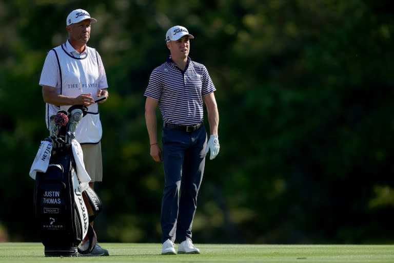 Two-time major winner Justin Thomas (R) announced he has split with veteran caddie Jim "Bones" MacKay (L) (Kevin C. Cox)