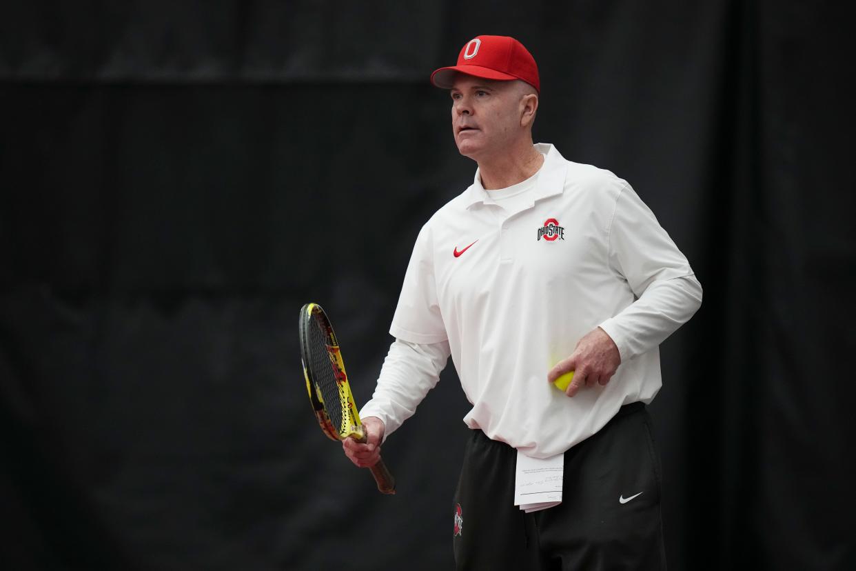 Ohio State Buckeyes head coach Ty Tucker warms up with players as they face South Carolina Gamecocks in the NCAA men’s tennis match on Feb. 11, 2024.