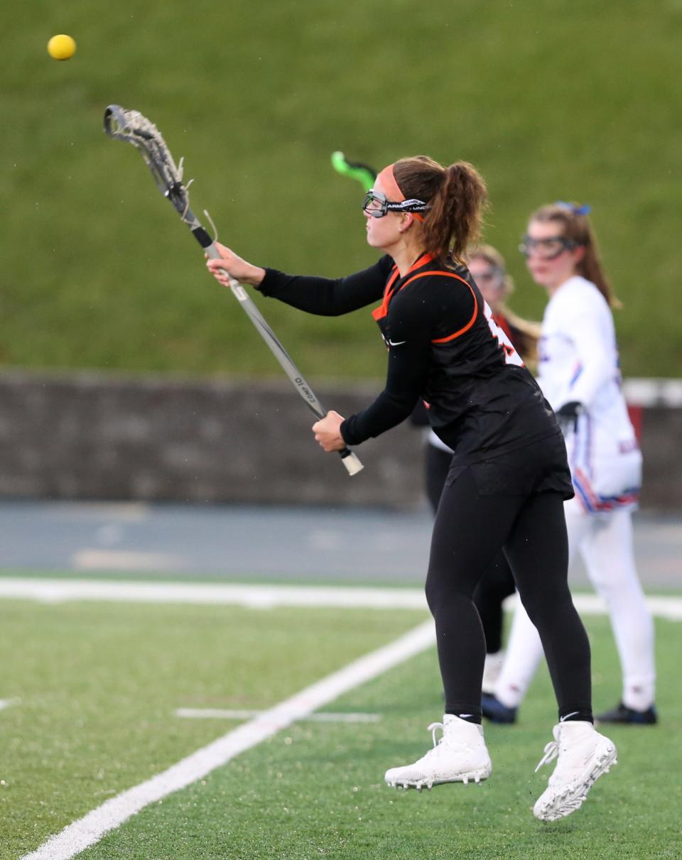 Lilly Altman of Hoover takes a shot during their game at Lake on Tuesday, April 19, 2022.