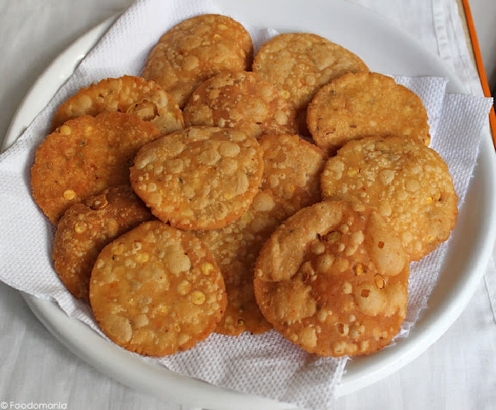 <p>Foodomania</p><p>Getting into some delicious edible gifts, this snack is predominantly made with rice flour, butter and some basic spices commonly used in the South-Indian cuisine, and gets deep-fried. </p><p><strong>Get the recipe: <a href="http://foodomania.com/thattai-recipe/" rel="nofollow noopener" target="_blank" data-ylk="slk:Thattai;elm:context_link;itc:0;sec:content-canvas" class="link rapid-noclick-resp">Thattai</a></strong></p>
