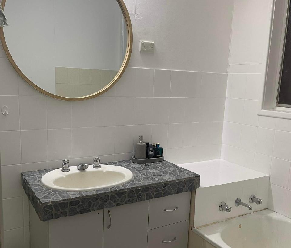 Emma's new bathroom vanity featuring the organic tiling 