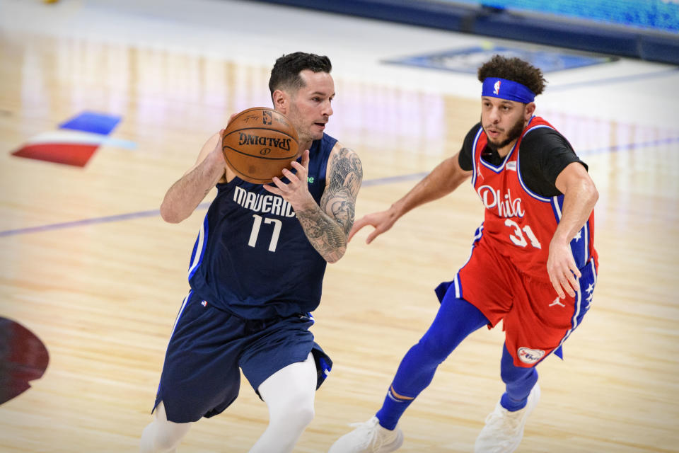 Apr 12, 2021; Dallas, Texas, USA; Dallas Mavericks guard JJ Redick (17) and Philadelphia 76ers guard Seth Curry (31) in action during the game between the Dallas Mavericks and the Philadelphia 76ers at the American Airlines Center. 