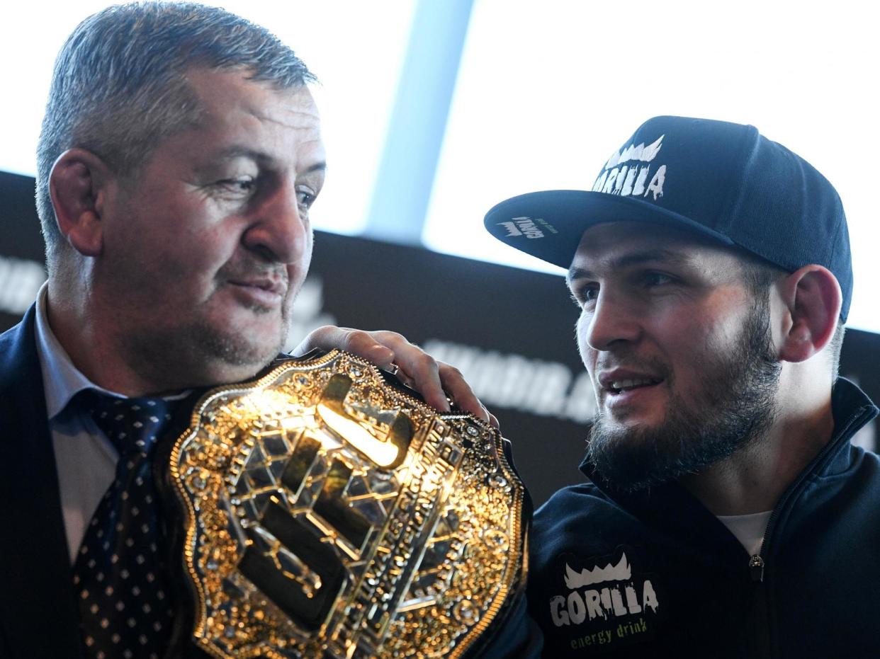 Abdulmanap Nurmagomedov (left) with his son, UFC lightweight champion Khabib Nurmagomedov: AFP via Getty Images