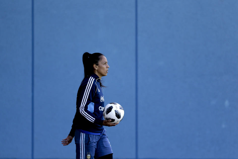 In this picture taken Nov. 1, 2018, Argentina national female soccer team goalkeeper Vanina Correa walks during a training session at the Argentina Football Association, in Buenos Aires, Argentina. Correa, the only mother in the national team, said the hardest part is being away from her children, Romeo and Luna. The 4-year-old twins stay with their grandmother while Correa trains for the playoff more than 185 miles (300 kilometers) from home. (AP Photo/Natacha Pisarenko)