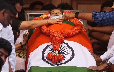 People pay homage to the body of Tamil Nadu Chief Minister Jayalalithaa Jayaraman, who died on Monday, in Chennai, India December 6, 2016. REUTERS/Adnan Abidi