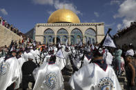 Palestinian scouts play music during celebrations marking the birthday of the Muslim Prophet Muhammad, at the Dome of the Rock Mosque in the Al Aqsa Mosque compound in the Old City of Jerusalem, Tuesday, Oct. 19, 2021. (AP Photo/Mahmoud Illean)