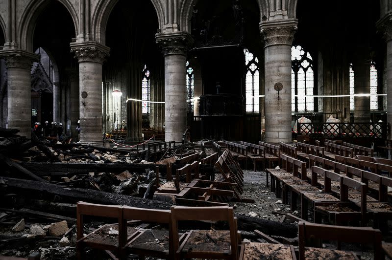 FILE PHOTO: A picture shows rubbles and damages during the preliminary work in the Notre-Dame Cathedral one month after it sustained major fire damage in Paris