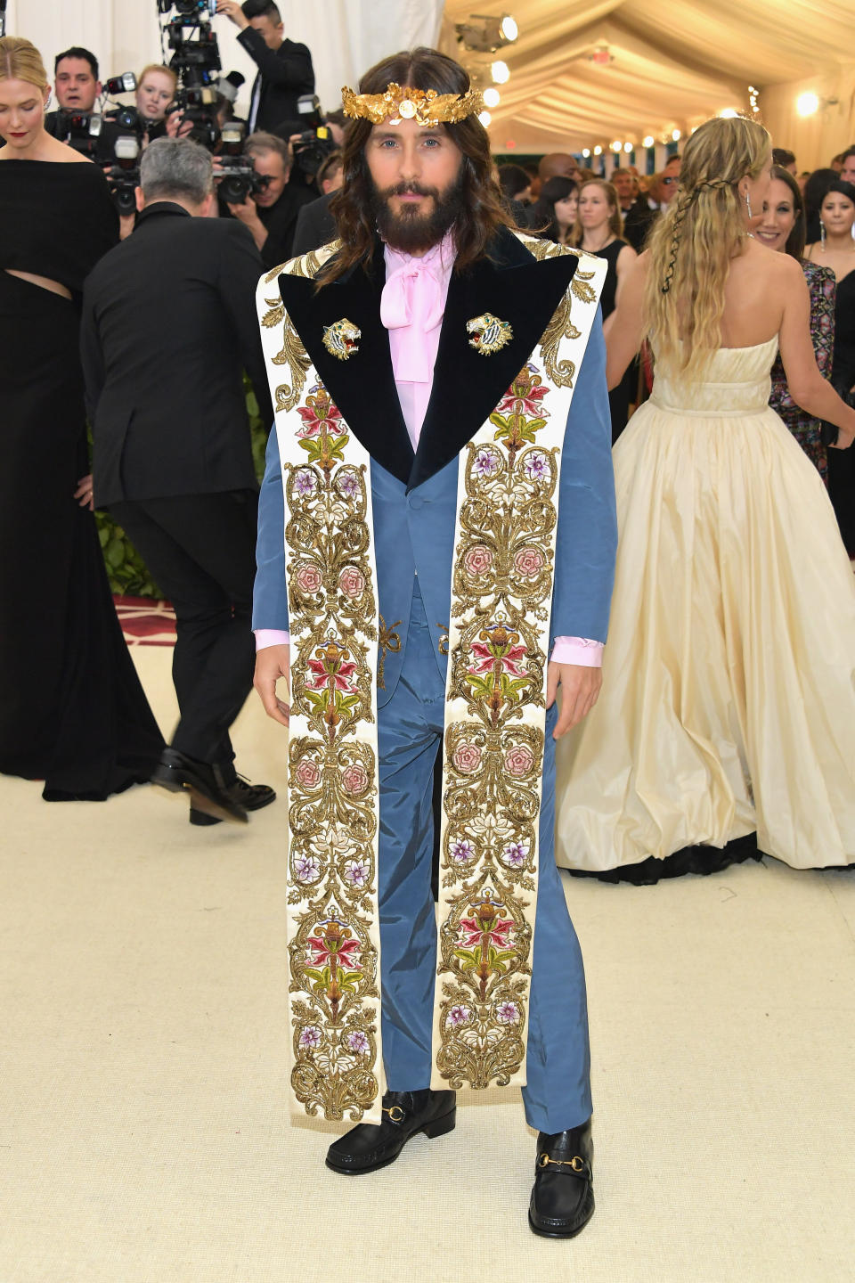 <p>Jared Leto is a walking advertisement for Gucci so it came as no surprise to see him rock a sky blue suit and pussy bow blouse by the Italian label. In keeping with the religious theme, he accessorised the look with a floral brocade shawl reminiscent of those that priests often don. Of course, his Jesus-inspired locks and accompanying crown further accentuated the look. <em>[Photo: Getty]</em> </p>