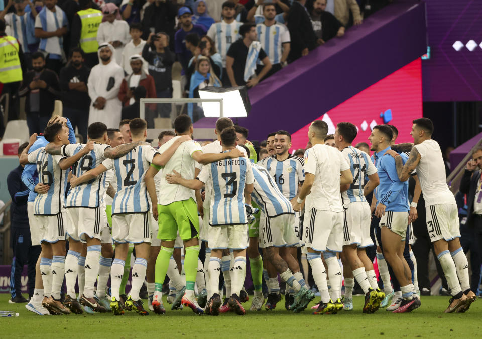 LUSAIL CITY, QATAR - DECEMBER 13: Players of Argentina celebrate the victory following the FIFA World Cup Qatar 2022 semifinal match between Argentina and Croatia at Lusail Stadium on December 13, 2022 in Lusail City, Qatar. (Photo by Jean Catuffe/Getty Images)