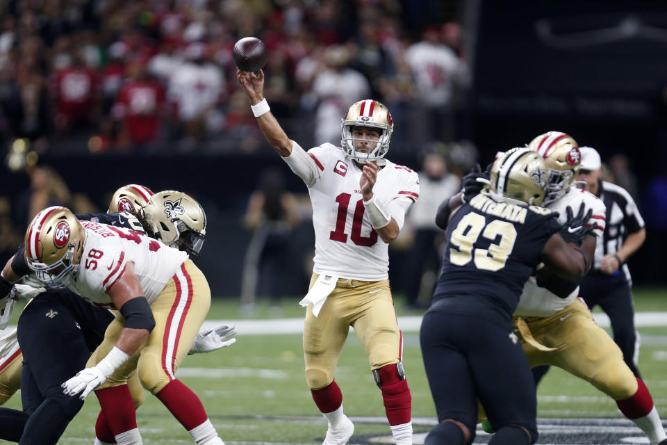 San Francisco 49ers quarterback Jimmy Garoppolo (10) passes in the first half an NFL football game against the New Orleans Saints in New Orleans, Sunday, Dec. 8, 2019. (AP Photo/Butch Dill)