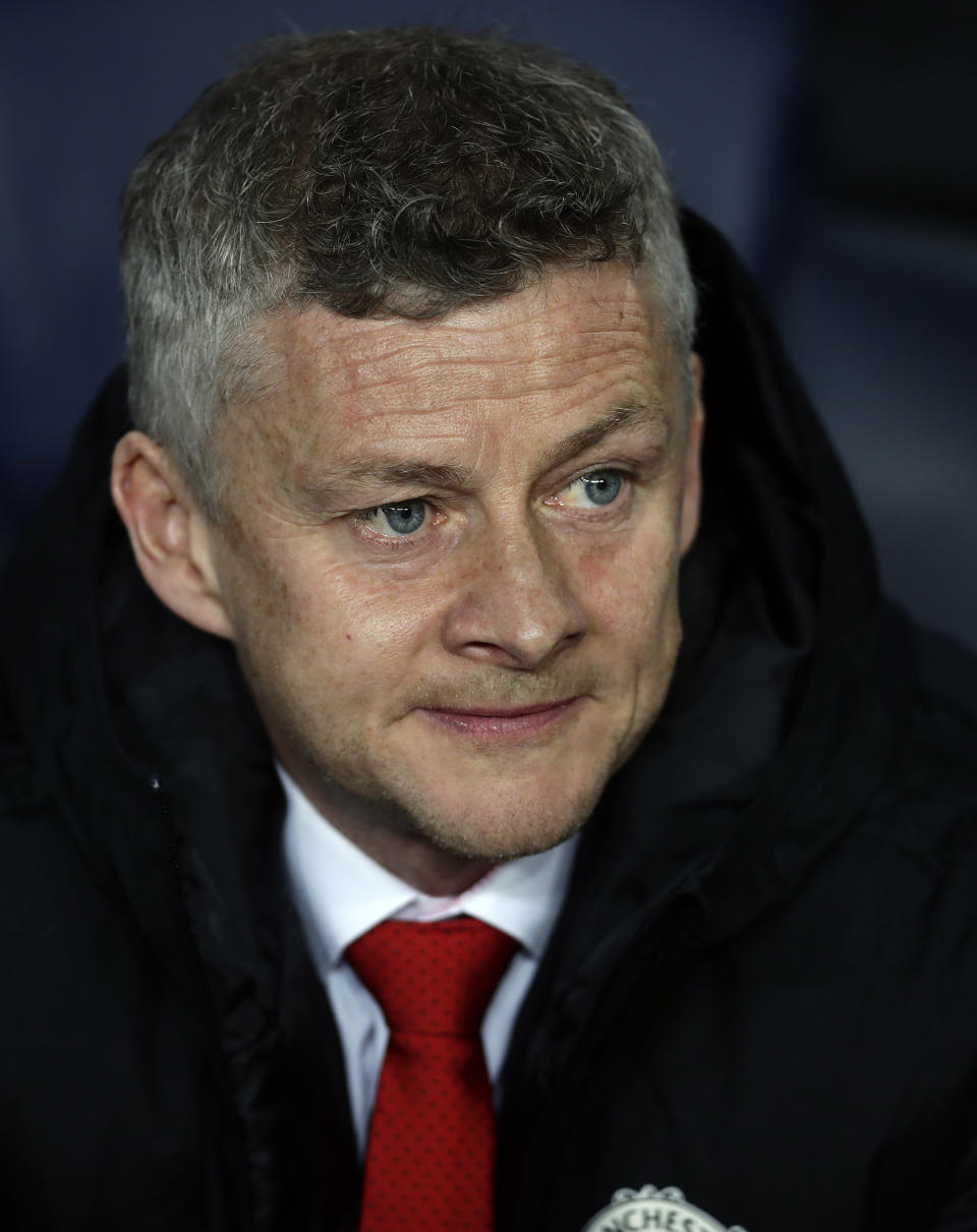 Manchester United coach Ole Gunnar Solskjaer looks out from the bench prior the Champions League quarterfinal, second leg, soccer match between FC Barcelona and Manchester United at the Camp Nou stadium in Barcelona, Spain, Tuesday, April 16, 2019. (AP Photo/Manu Fernandez)