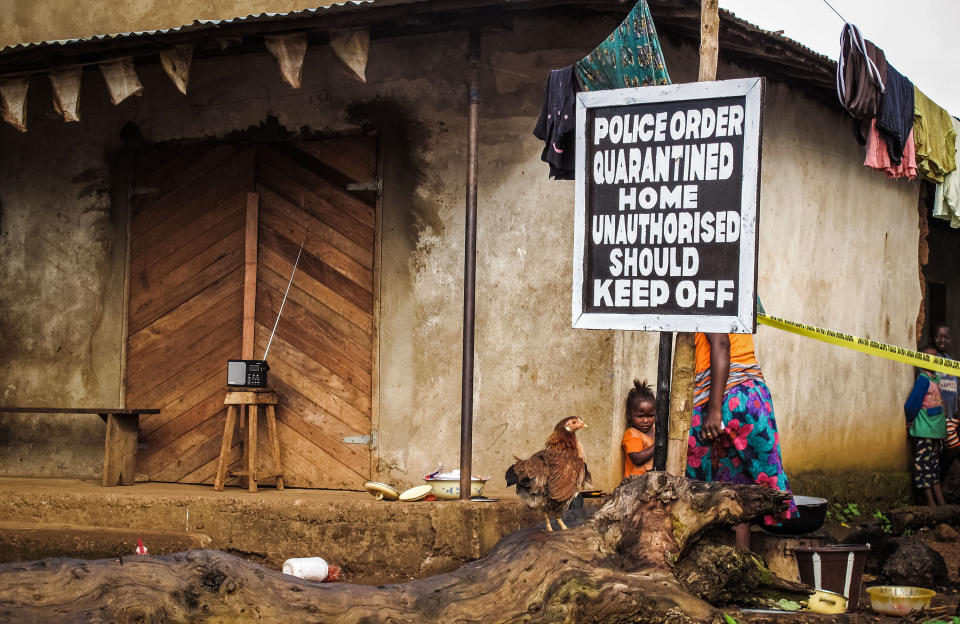 A home is quarantined in an effort to combat the spread of the Ebola virus, Port Loko, Sierra Leone, in 2014. (Photo: Michael Duff/AP)