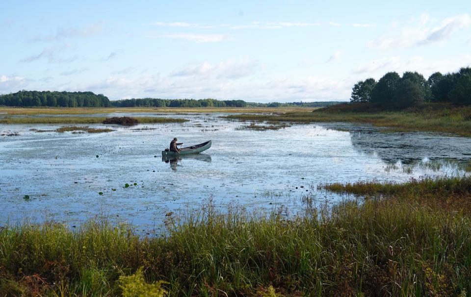 Jim Henning of Grafton paddles a canoe Sept. 25 during a duck hunt at Crex Meadows Wildlife Area near Grantsburg.