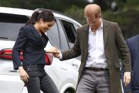 <p>Prince Harry gave his wife a helping hand as they visited Redvale, New Zealand on the third day of their royal tour of the country. </p>