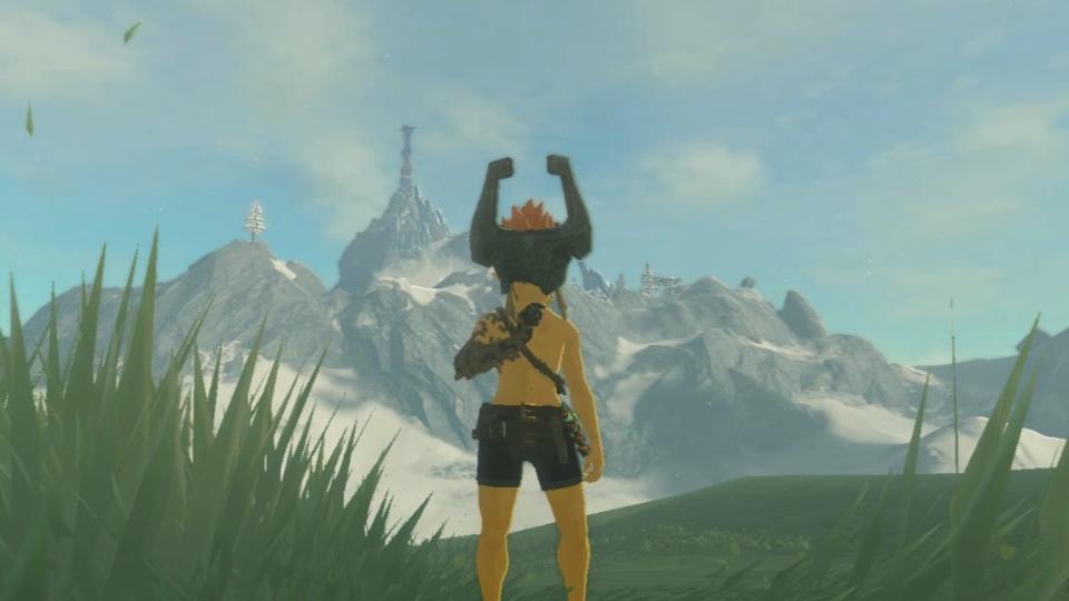 Link stands wearing the Midna Helmet