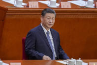 Chinese President Xi Jinping attends the opening session of the Chinese People's Political Consultative Conference in the Great Hall of the People in Beijing, Monday, March 4, 2024. (AP Photo/Tatan Syuflana)