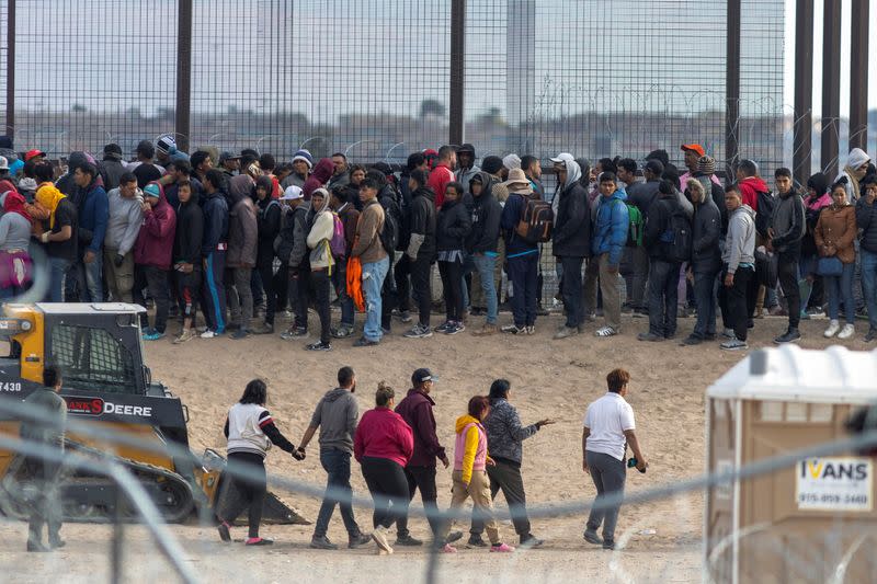 Migrants cross into the U.S. as seen from Ciudad Juarez