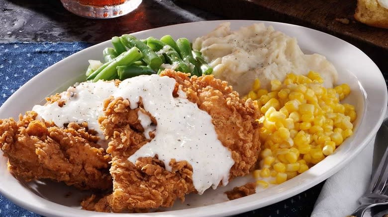 chicken fried chicken and gravy, green beans, mashed potatoes, corn