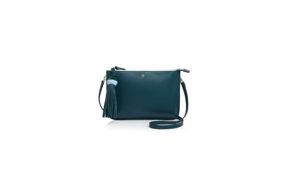 <p>With deep teal leather and a bobber-inspired tassel, this Tory Burch bag practically begs <a rel="nofollow noopener" href="http://www.travelandleisure.com/trip-ideas/beach-vacations" target="_blank" data-ylk="slk:to be worn seaside;elm:context_link;itc:0;sec:content-canvas" class="link ">to be worn seaside</a>.</p><p>To buy: <a rel="nofollow noopener" href="http://click.linksynergy.com/fs-bin/click?id=93xLBvPhAeE&subid=0&offerid=364103.1&type=10&tmpid=2425&RD_PARM1=http%3A%2F%2Fwww1.bloomingdales.com%2Fshop%2Fproduct%2Ftory-burch-tassel-crossbody%3FID%3D1702516%26CategoryID%3D16958&u1=TL_crossbodybags" target="_blank" data-ylk="slk:bloomingdales.com;elm:context_link;itc:0;sec:content-canvas" class="link ">bloomingdales.com</a>, $250.</p>