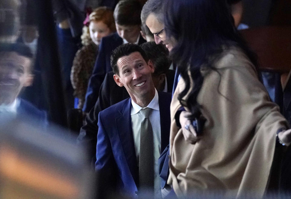 Craig Breslow, Boston Red Sox chief baseball officer, chats with Sam Kennedy, team president, while riding an escalator prior to a news conference at Fenway Park, Thursday, Nov. 2, 2023, in Boston. (AP Photo/Charles Krupa)