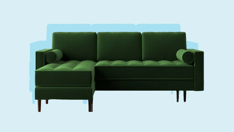 Go for something elegant with this emerald green velvet sofa.