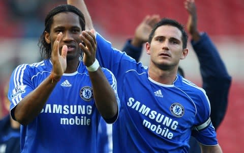Frank Lampard and Didier Drogba applaud the Chelsea fans - Credit: getty images