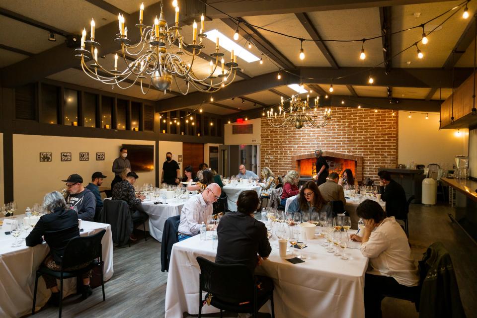 Judges taste wines at the azcentral Arizona Wine Competition at the Newton in Phoenix, Ariz., on Feb. 28, 2022.