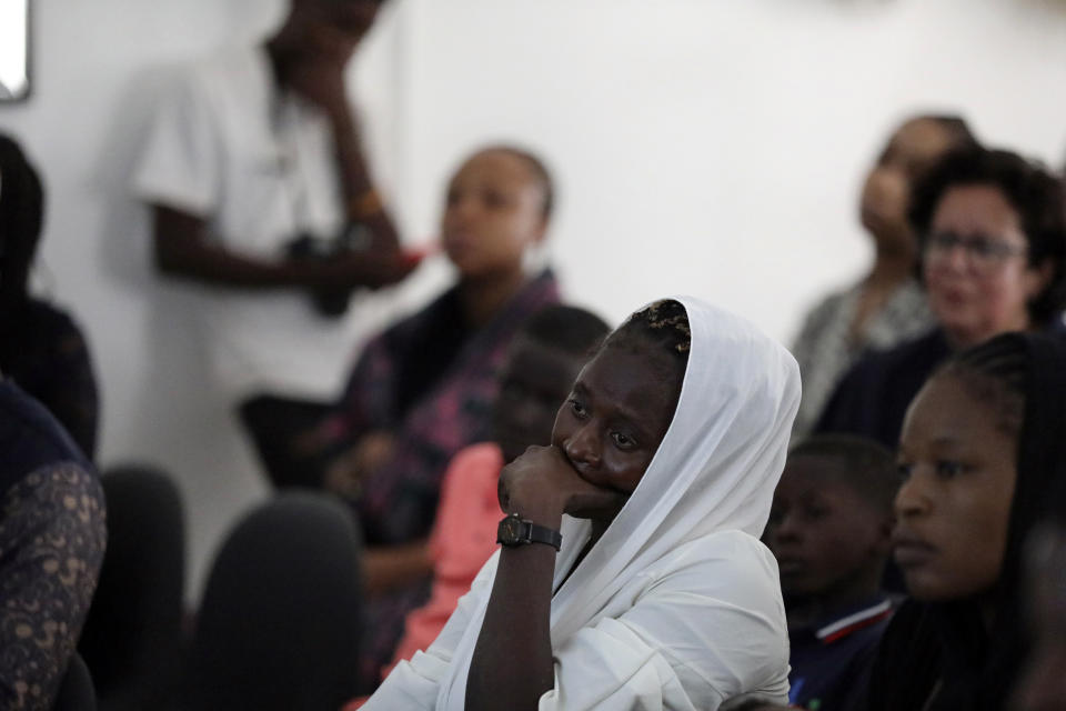 Esther Nkeki, whose sister Mary Nkeki, one of the Chibok schoolgirls who was kidnapped in 2014 by Islamic extremists and later released, attends a 10th anniversary event of the abduction in Lagos, Nigeria, Thursday, April 4, 2024. A new film in Nigeria is being screened to remember the nearly 100 schoolgirls who are still in captivity 10 years after they were seized from their school in the country’s northeast. (AP Photo/Mansur Ibrahim)